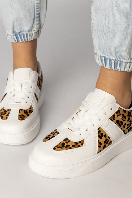 Baskets de sport blanches à motif...