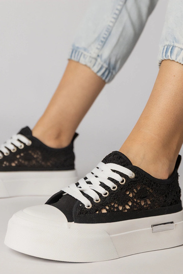 Baskets de sport noires à...