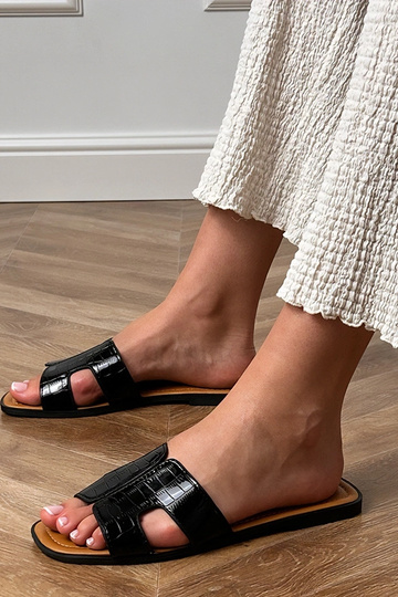 Tongs noires à semelle... 2