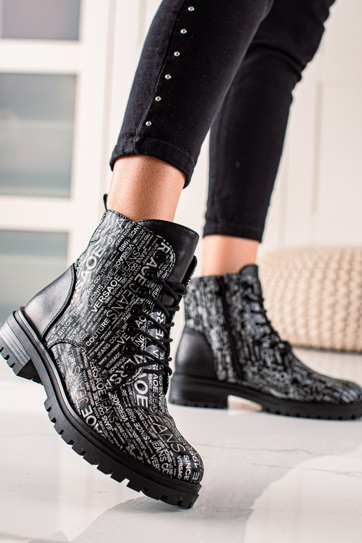 bottes avec imprimé pour femme en noir bottes avec imprimé pour femme en noir