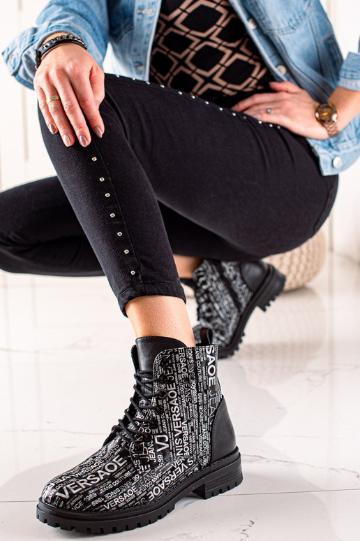 bottes avec imprimé pour femme en noir bottes avec imprimé pour femme en noir