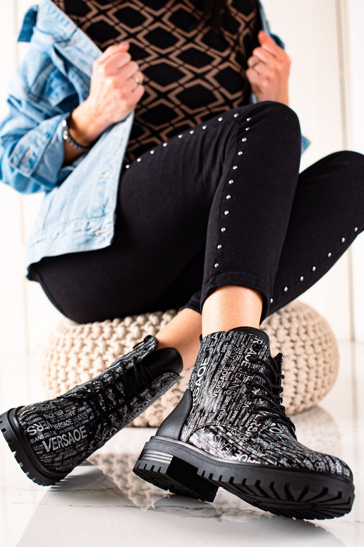 bottes avec imprimé pour femme en noir bottes avec imprimé pour femme en noir