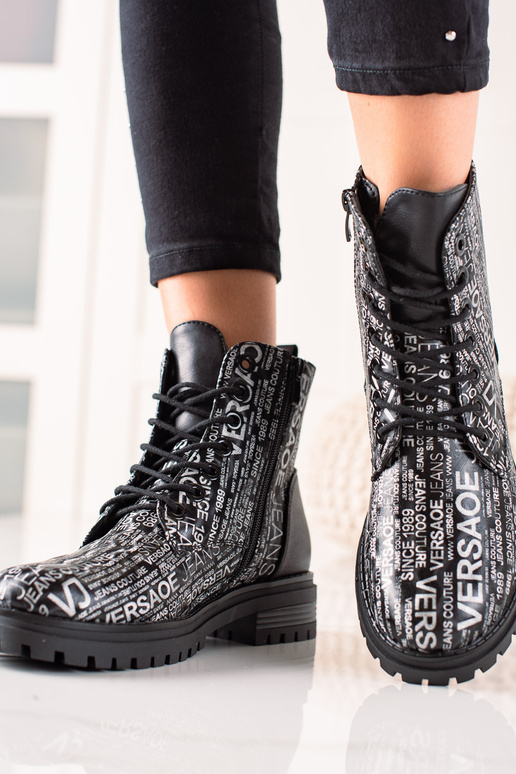 bottes avec imprimé pour femme en noir bottes avec imprimé pour femme en noir