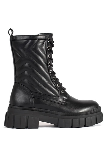 Bottes avec motif piqué