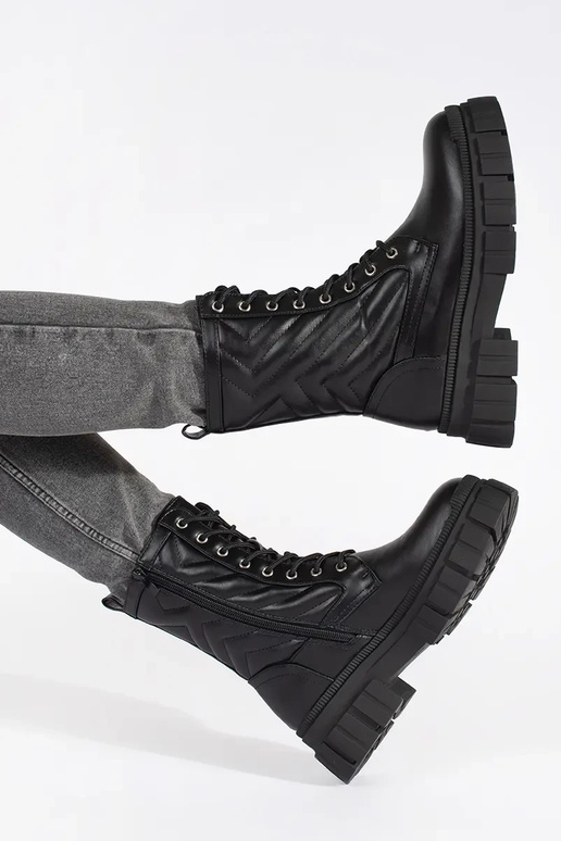 Bottes avec motif piqué