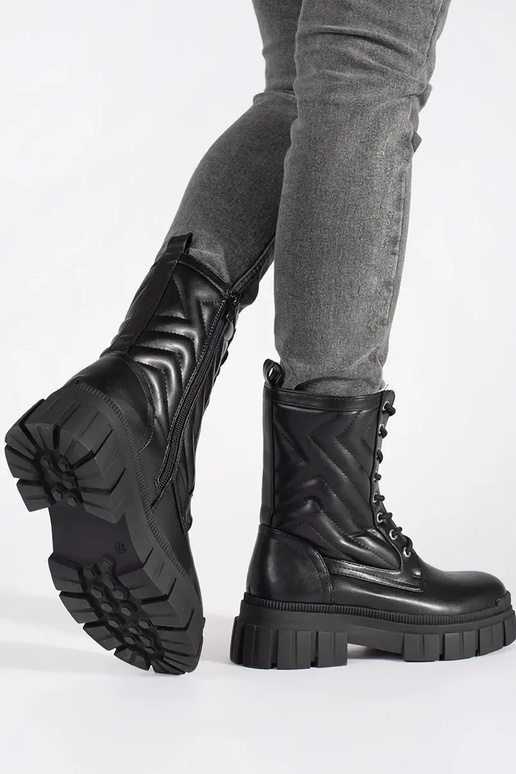 Bottes avec motif piqué