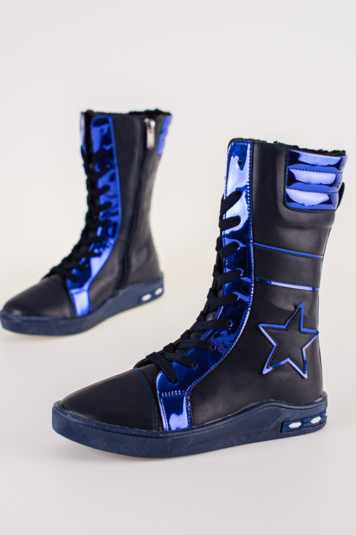 Bottes en cuir pour fille avec une... Bottes en cuir pour fille avec une...