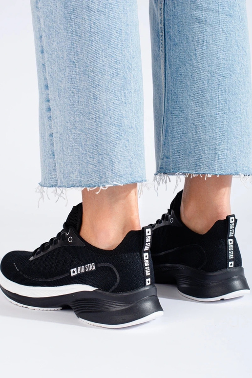 chaussures de sport noires à talon...