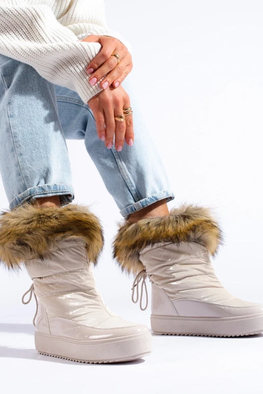 Bottines de neige femme crème avec...