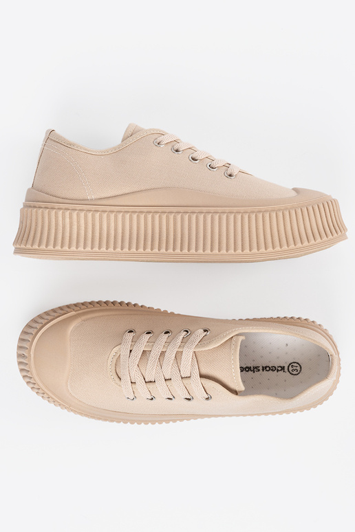 Chaussures beige pour femmes avec... Chaussures beige pour femmes avec...