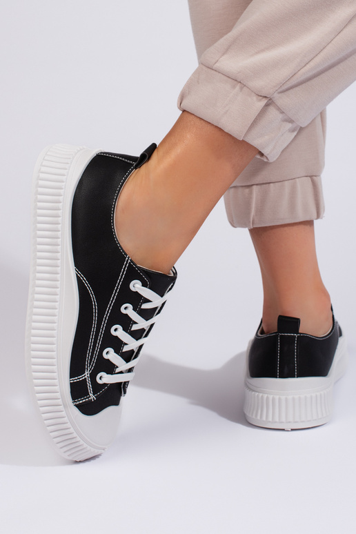 Baskets noires pour femmes modèle... Baskets noires pour femmes modèle...