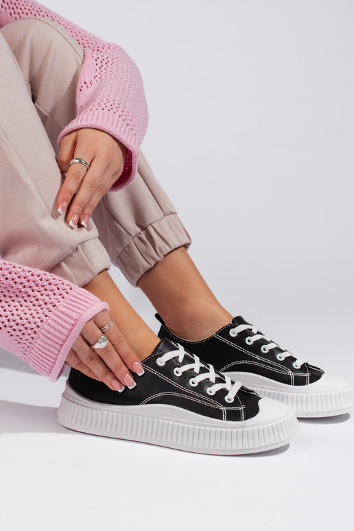 Baskets noires pour femmes modèle... Baskets noires pour femmes modèle...