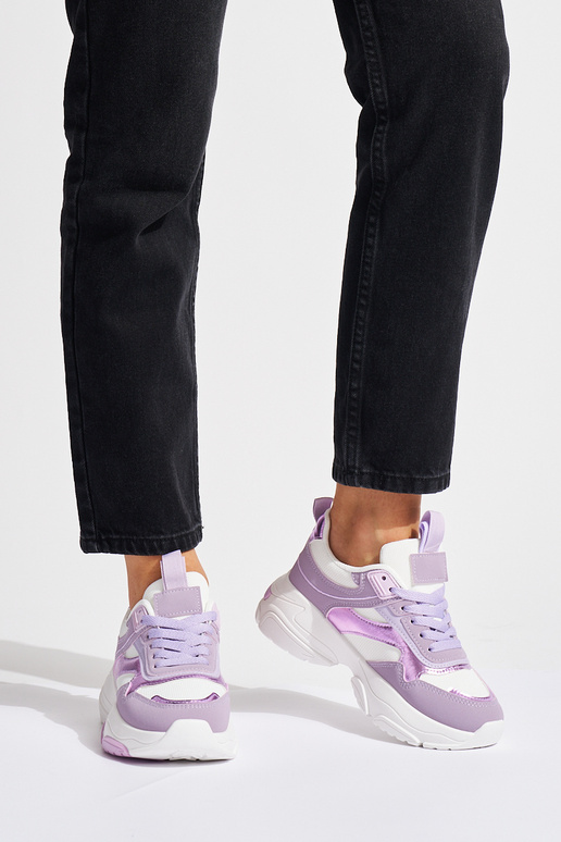 Chaussures de sport violettes pour... Chaussures de sport violettes pour...