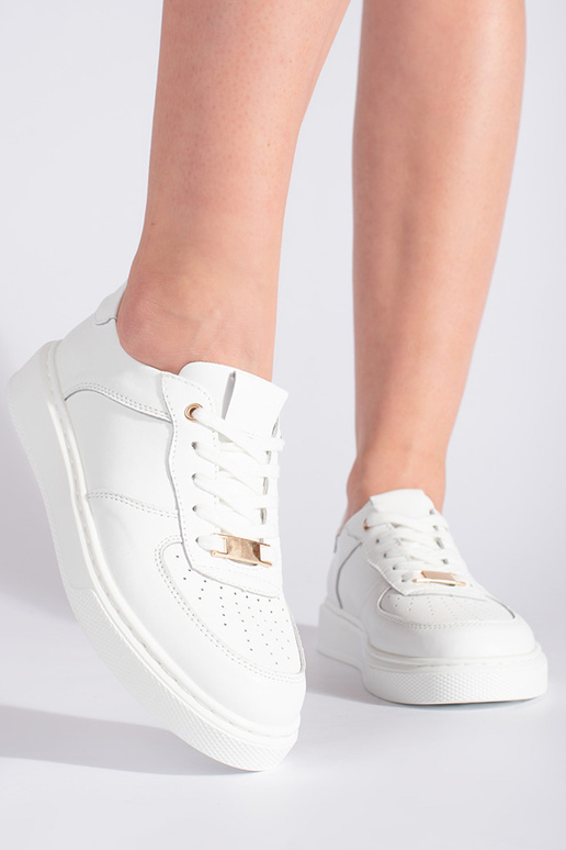 chaussures de sport en cuir blanches... chaussures de sport en cuir blanches...