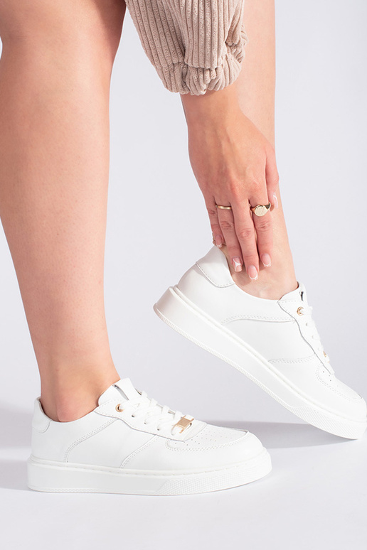 chaussures de sport en cuir blanches... chaussures de sport en cuir blanches...