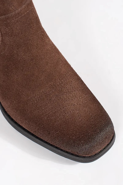 Bottes de cow-boy en cuir marron...