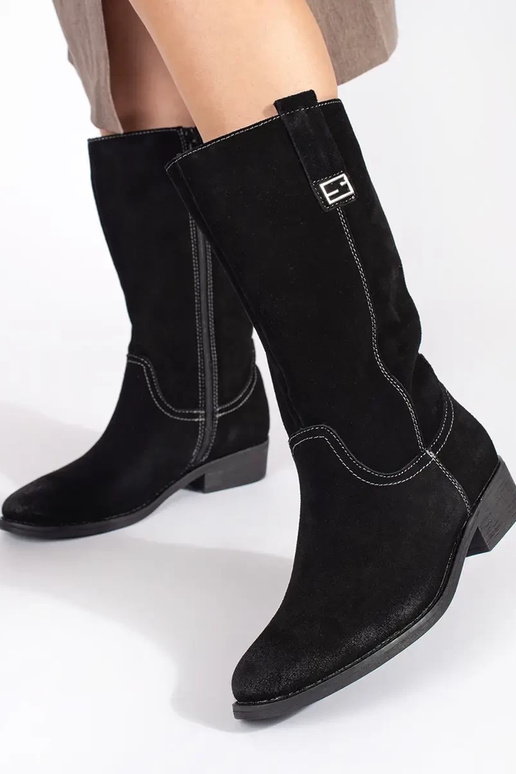 Bottes longues en cuir de cow-boy... Bottes longues en cuir de cow-boy...