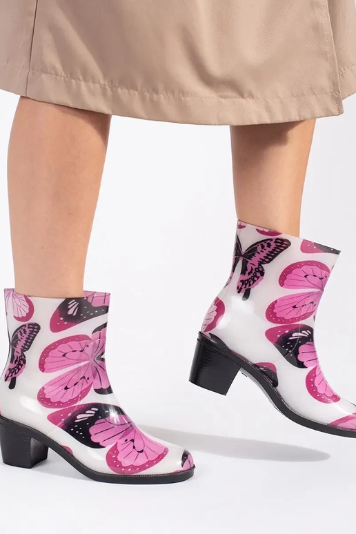 Bottes en caoutchouc À motyle sur des...