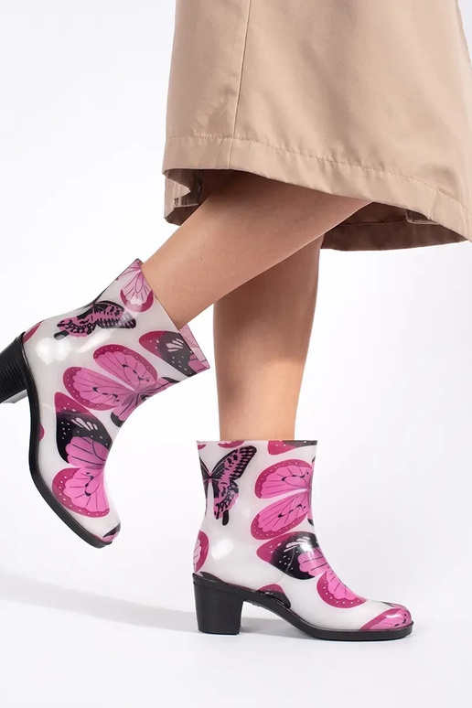 Bottes en caoutchouc À motyle sur des...