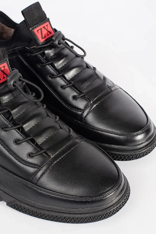 couleur noire chaussures de sport...