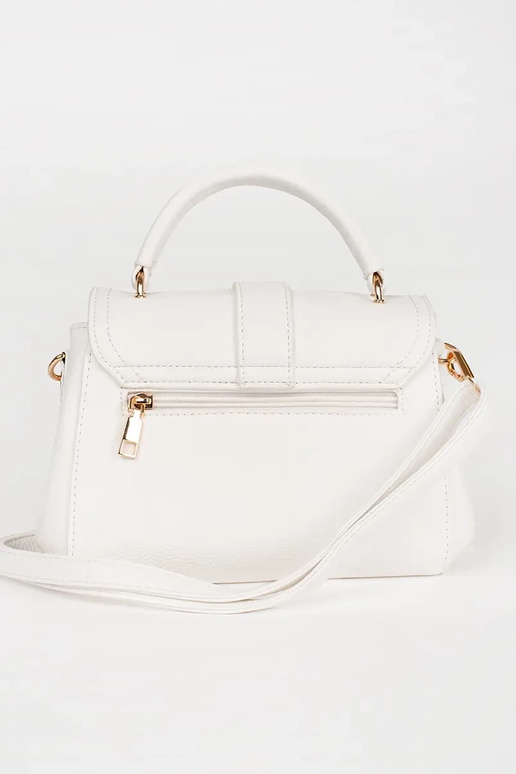Petit sac blanc avec des éléments dorés