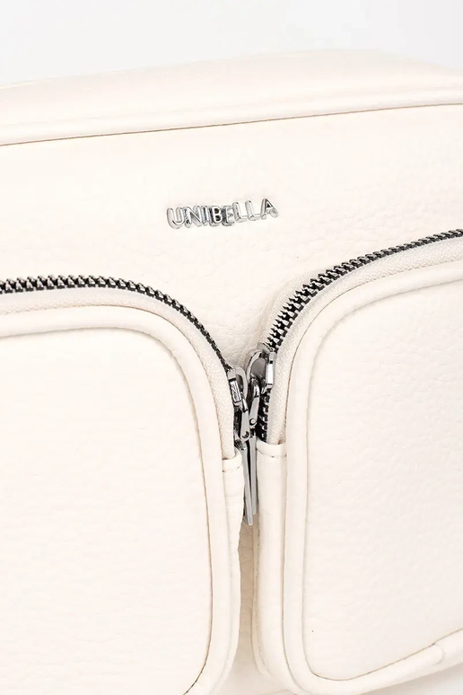 Petit sac en couleur orange avec poches