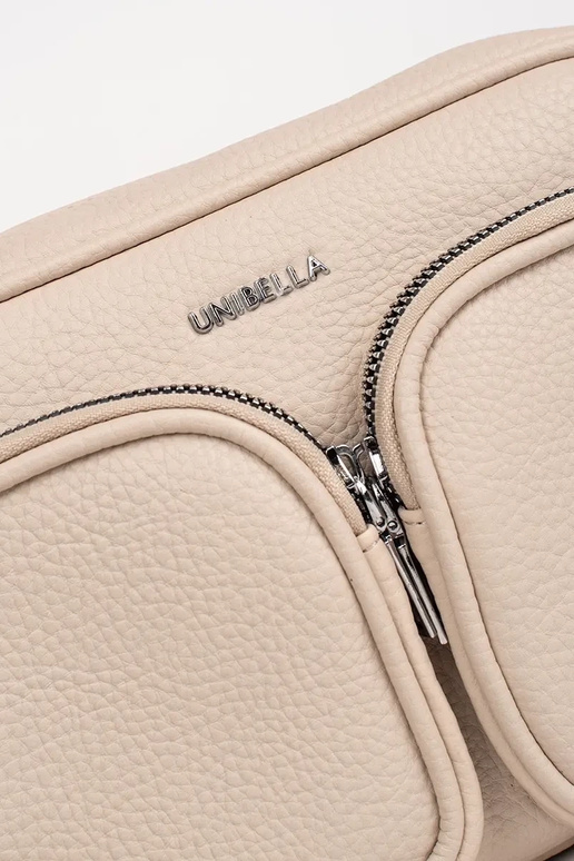 Petit sac en couleur ivoire avec poches