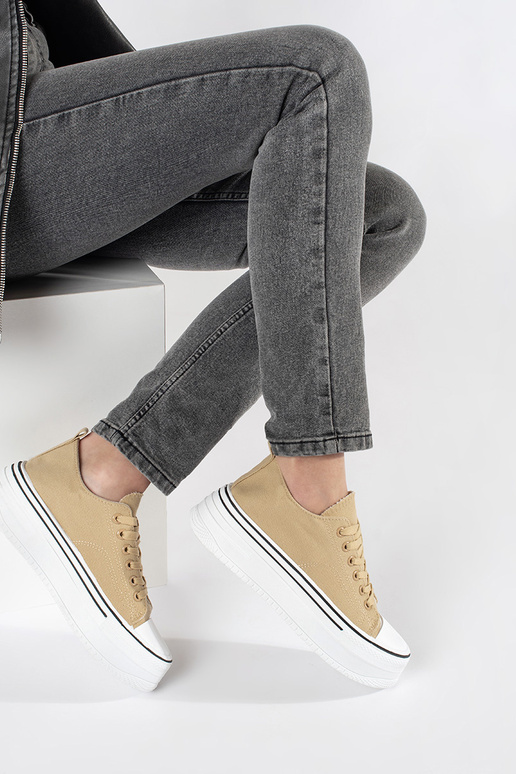 Baskets sportives couleur sable avec... Baskets sportives couleur sable avec...