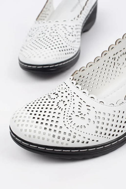 Sandales blanches à plateforme avec... Sandales blanches à plateforme avec...