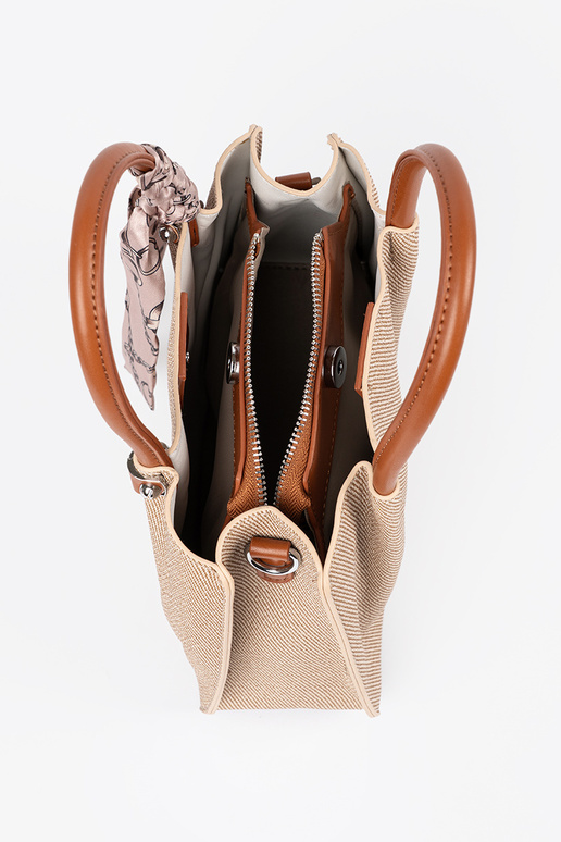 Petit sac gris avec une poignée