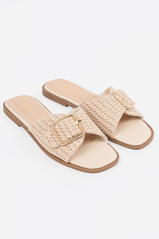 Chaussons couleur sable avec des boucles Chaussons couleur sable avec des boucles