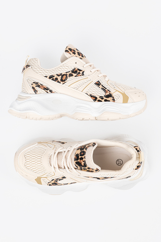 Baskets beiges de style sportif avec...