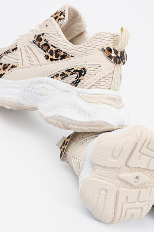 Baskets beiges de style sportif avec...