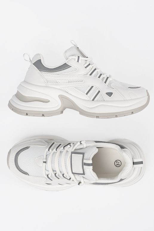 Chaussures pour femmes blanches avec... Chaussures pour femmes blanches avec...