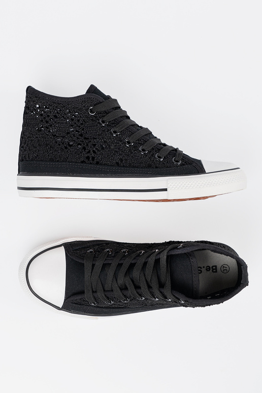 Bottes hautes noires avec détails...