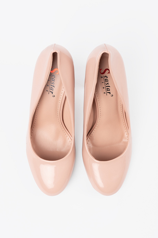 Chaussures à talons hauts en ivoire...