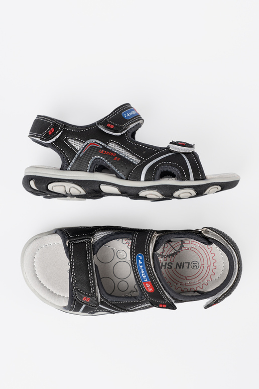 couleur noire de garçon des sandales