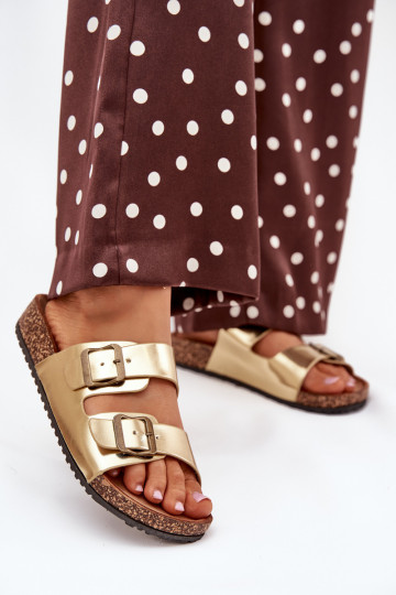 Féminin Chaussons avec une plateforme avec boucles couleur dorée Vesina