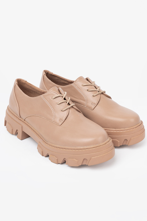 beige attaché demi-chaussures avec une plateforme