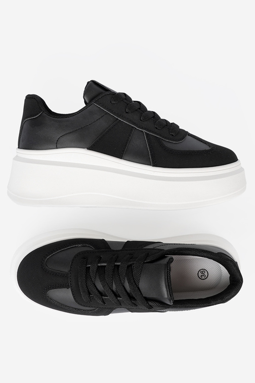 Modèle classique couleur noire Chaussures modèle baskets sur une semelle épaisse Modèle classique couleur noire Chaussures modèle baskets sur une semelle épaisse