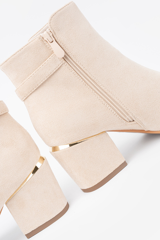 couleur ivoire bottes avec boucle décorative couleur ivoire bottes avec boucle décorative