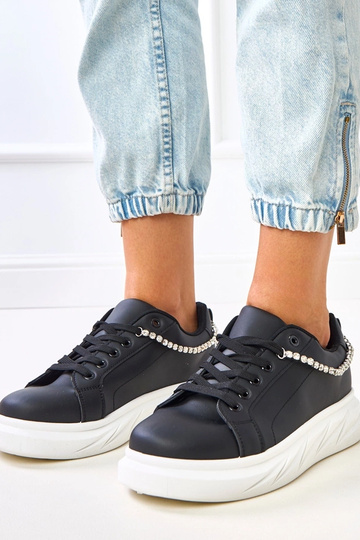Baskets noires sur...
