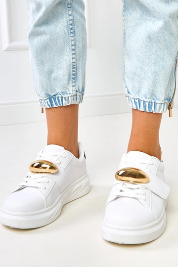 Baskets blanches sur...
