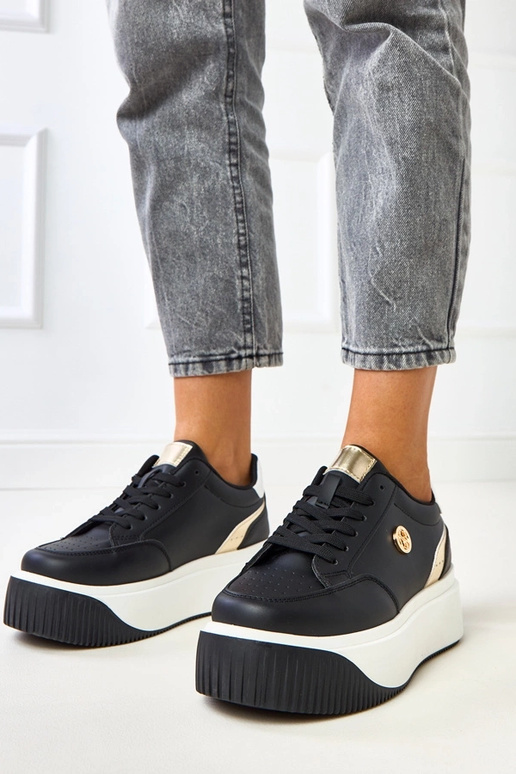 Baskets noires à plateforme avec... Baskets noires à plateforme avec...