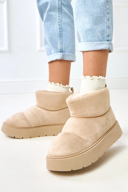 Bottes de neige beiges claires...