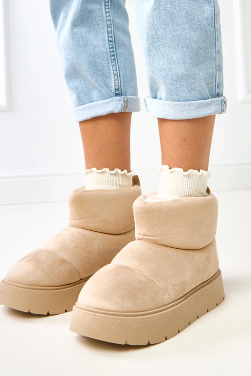 Bottes de neige beiges claires...