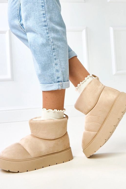 Bottes de neige beiges claires...