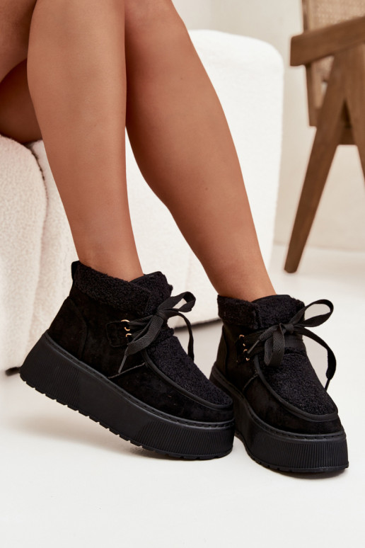 Bottes de neige Féminin avec une plateforme avec un manteau de fourrure couleur noire Florivelle Bottes de neige Féminin avec une plateforme avec un manteau de fourrure couleur noire Florivelle