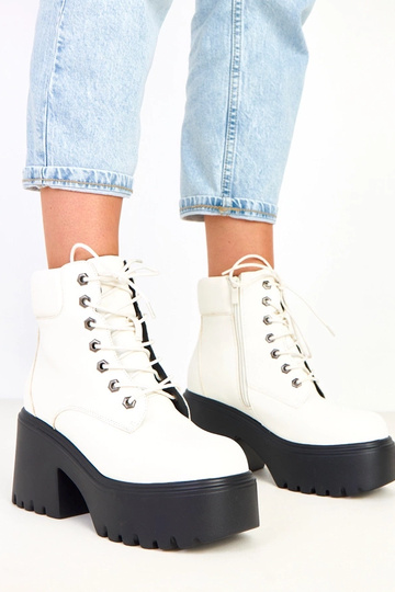 Bottines blanches à talon...