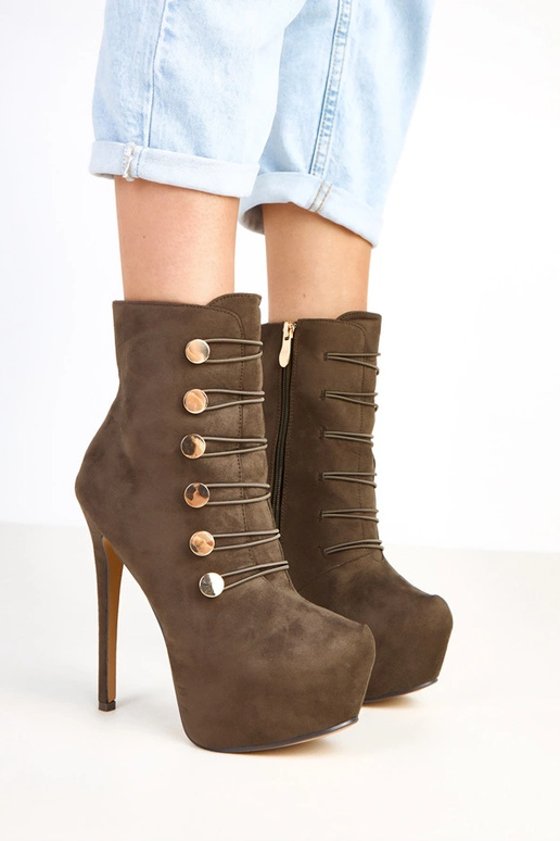 Bottes vertes sur plateforme et talon...